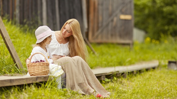 Woman and child with basket of cherries