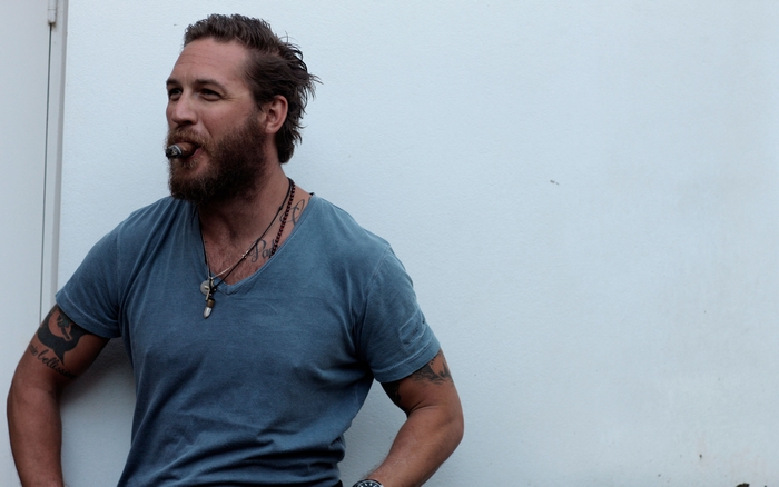Tom Hardy smoking a cigar