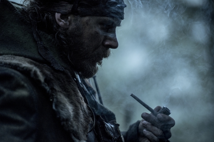 Tom Hardy smoking a pipe