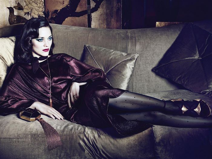 Marion Cotillard on a couch