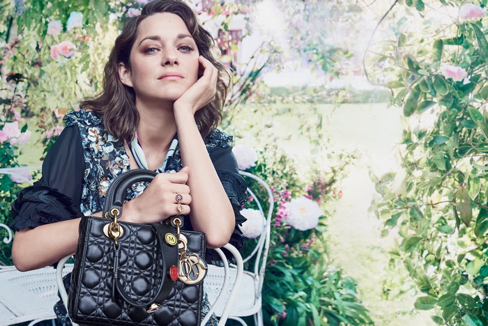 Marion Cotillard with Dior handbag