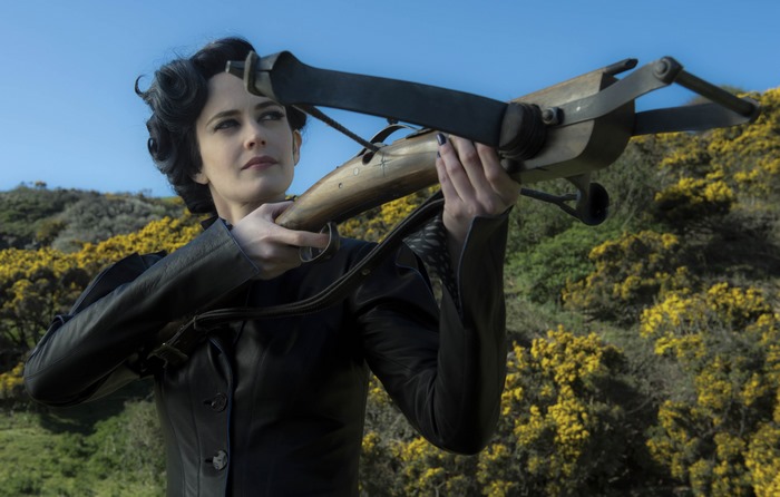 Eva Green with a crossbow