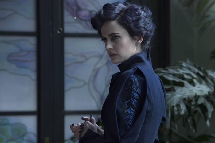 Eva Green in a dark blue dress