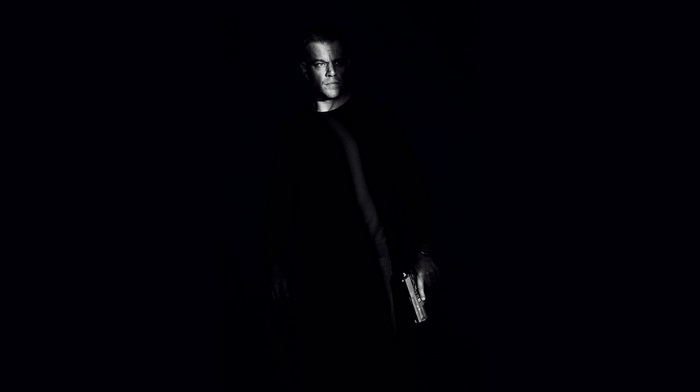 Matt Damon holding a gun