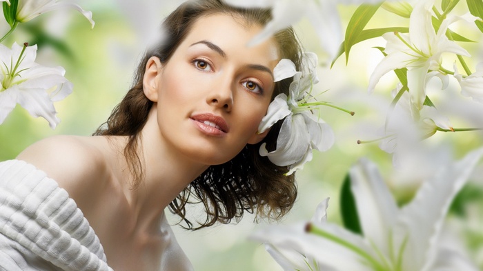 Woman with white lilies