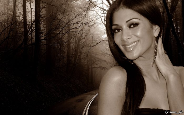 Nicole Scherzinger in a foggy forest