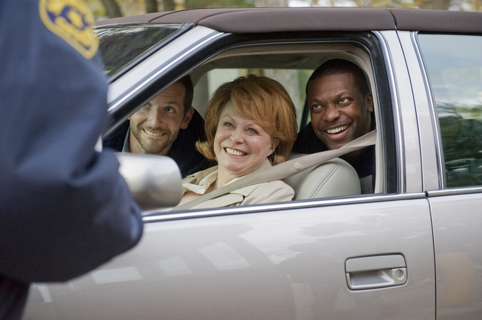 Bradley Cooper, Ed Helms, and unidentified woman in car
