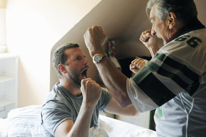 Bradley Cooper and an older man boxing