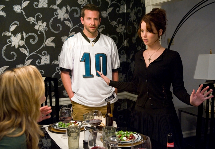 Bradley Cooper in a football jersey