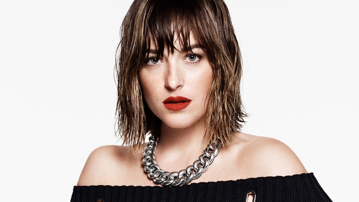Dakota Johnson with wet hair and red lipstick