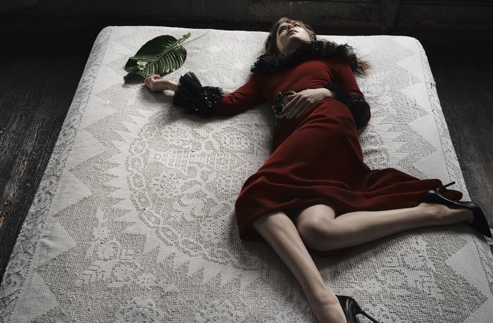 Dakota Johnson on a patterned rug