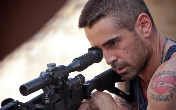Colin Farrell with a sniper rifle