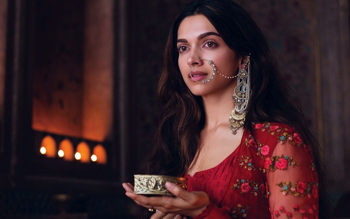 Deepika Padukone holding a decorative box
