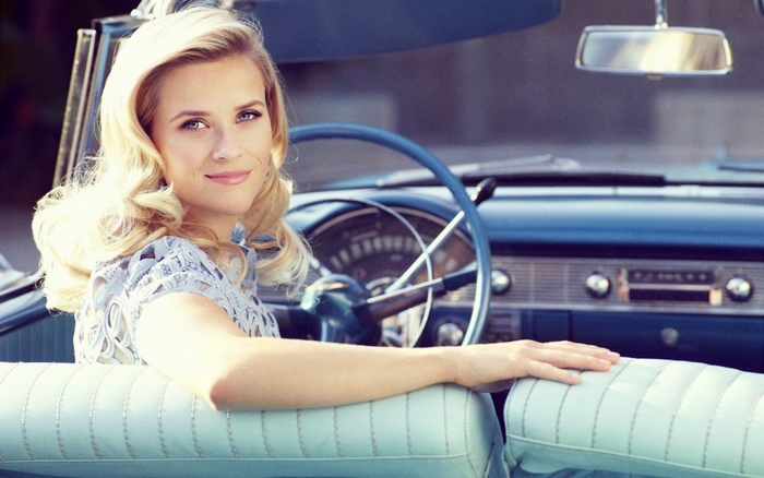 Reese Witherspoon in a vintage car
