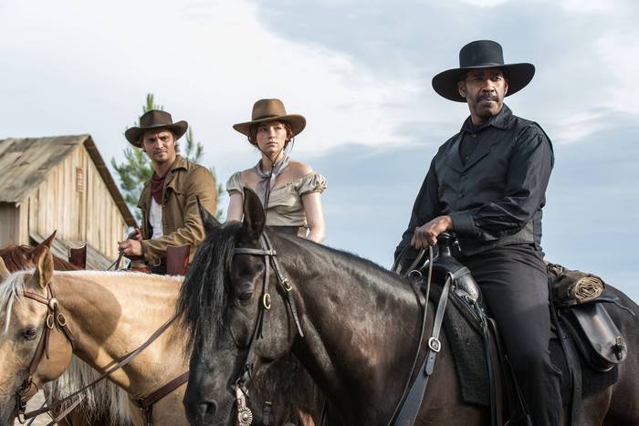 Denzel Washington and companions on horseback