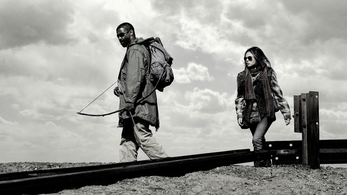 Denzel Washington and young woman walking