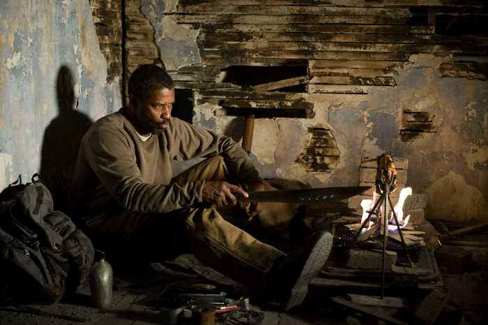 Denzel Washington in a dilapidated room