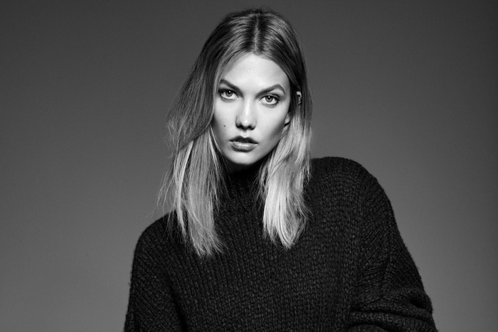 Karlie Kloss in a black sweater
