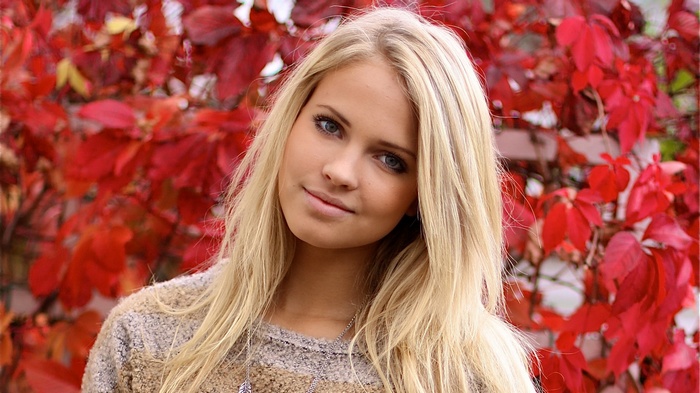 Young woman with blonde hair and blue eyes