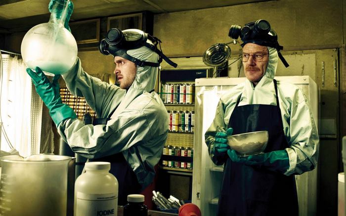 Aaron Paul and Bryan Cranston in a lab