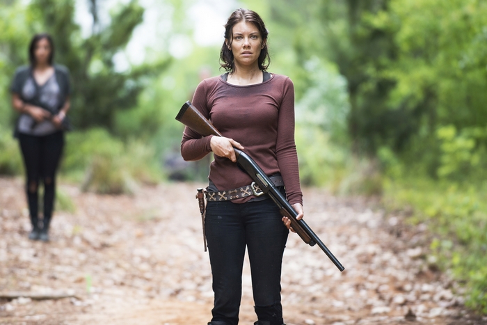 Lauren Cohan holding a shotgun