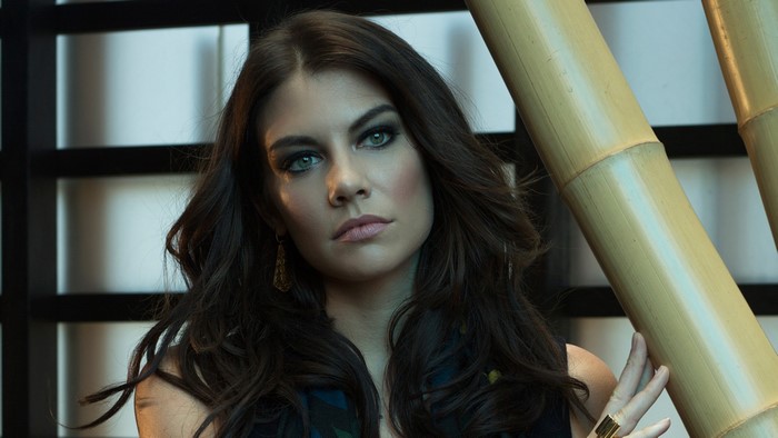 Lauren Cohan posing with bamboo
