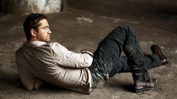 Gerard Butler lying on the ground