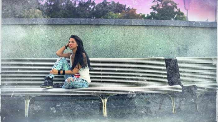 Woman sitting on a bench
