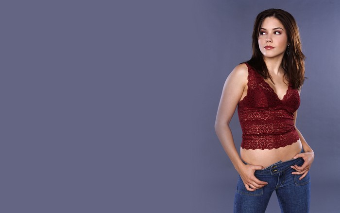 Sophia Bush in a red lace top and jeans