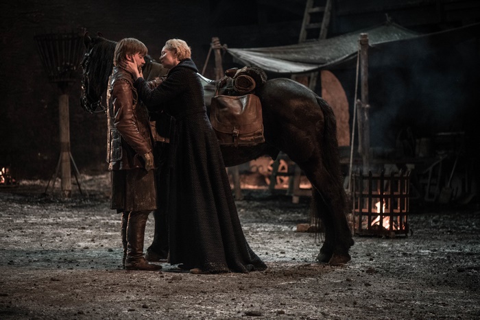 Gwendoline Christie with a young man and a horse