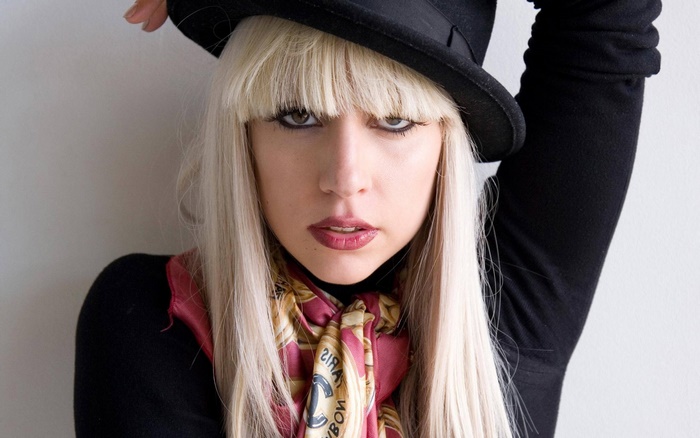 Lady Gaga wearing a hat and scarf