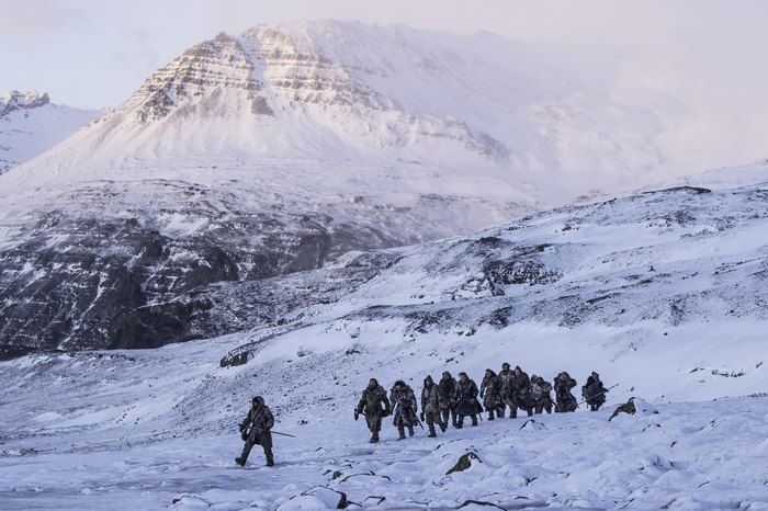 The Hound from Game of Thrones in a snowy landscape