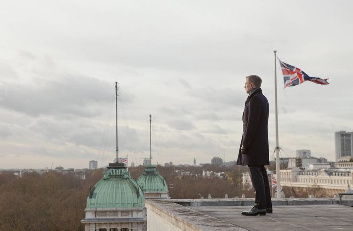 Daniel Craig on a rooftop with Union Jack flag