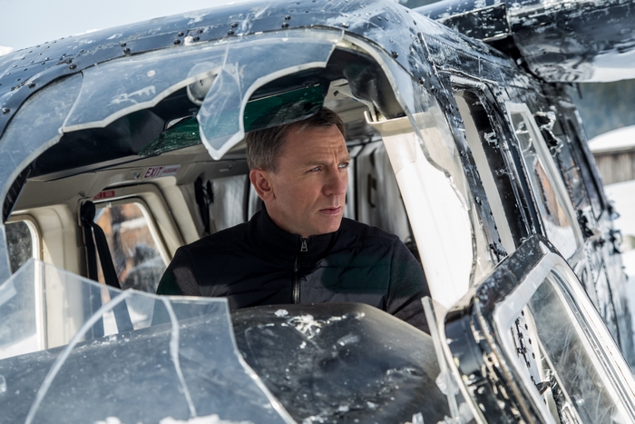 Daniel Craig in a damaged helicopter