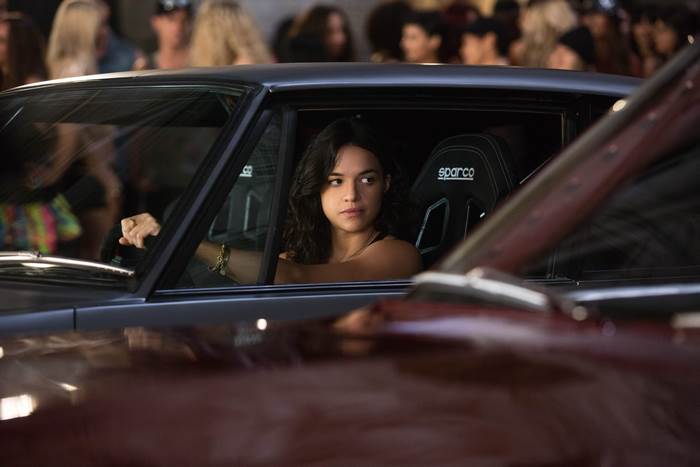 Michelle Rodriguez driving a car