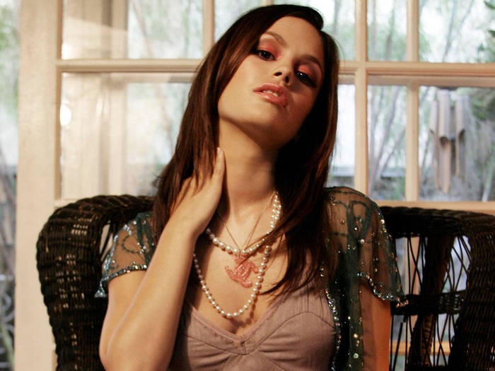 Rachel Bilson sitting in a chair