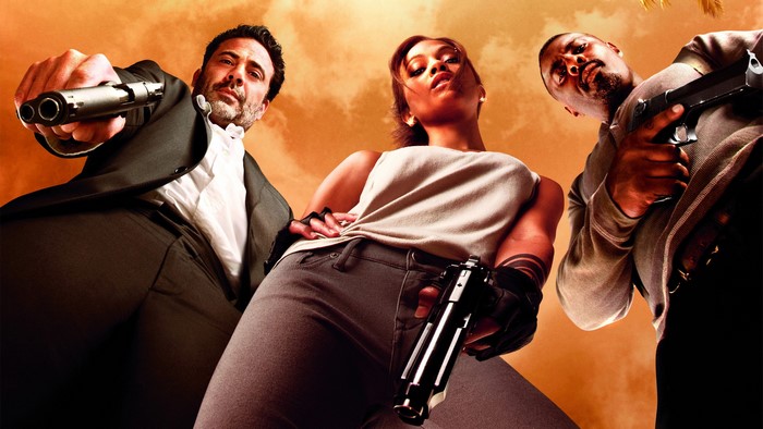 Jeffrey Dean Morgan, Zoe Saldana, and Idris Elba with guns