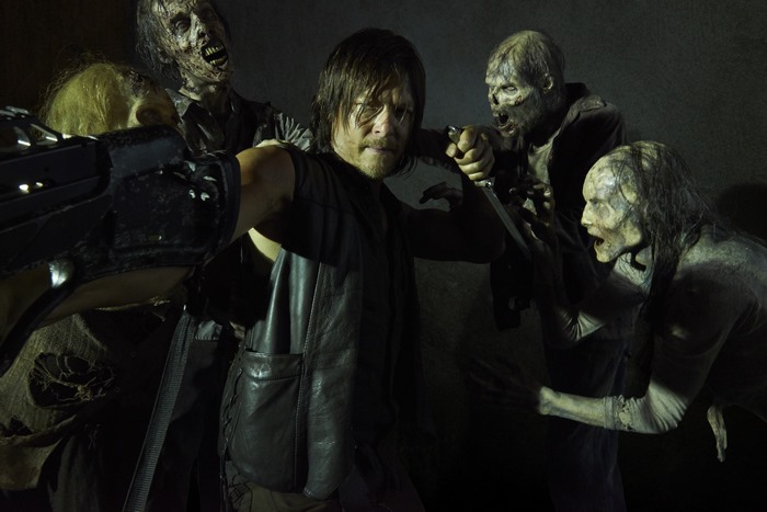 Norman Reedus fighting zombies