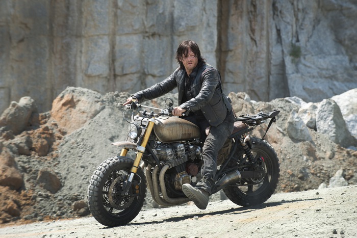 Norman Reedus on a motorcycle in a quarry