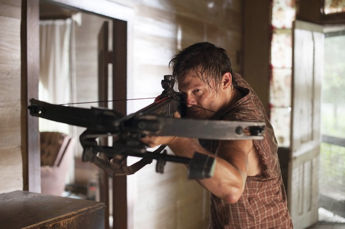 Norman Reedus with a crossbow