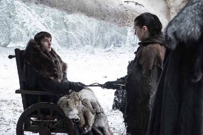 Bran Stark and Arya Stark in a snowy forest