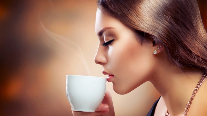 Woman drinking coffee