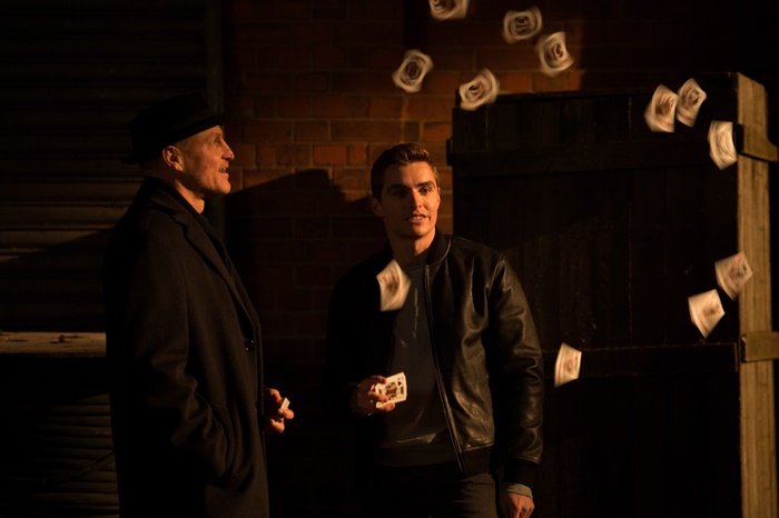 Woody Harrelson and Dave Franco throwing cards