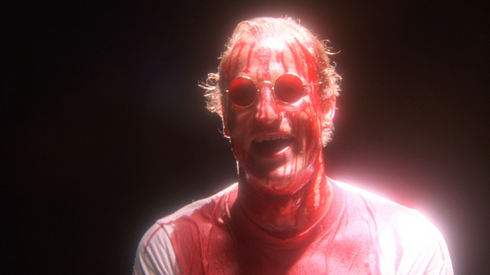 Woody Harrelson covered in blood