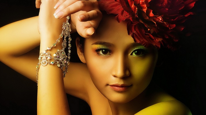 Woman with flower and jewelry