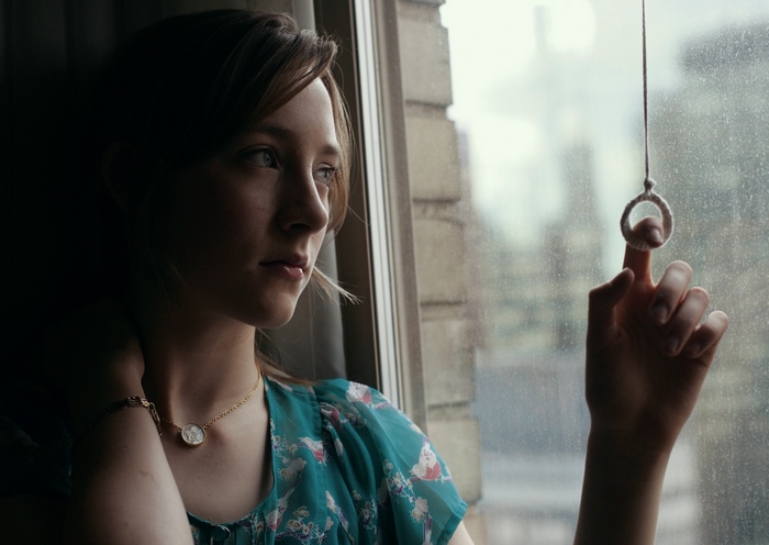 Saoirse Ronan looking out a window