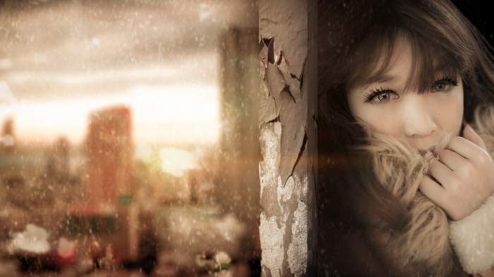 Woman in fur coat looking through window