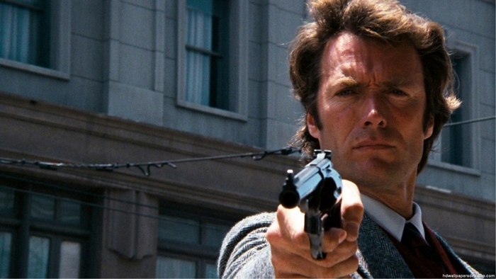 Clint Eastwood holding a gun