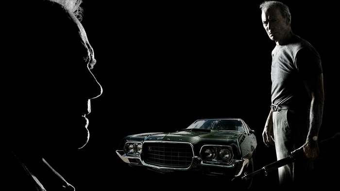 Clint Eastwood with a car and rifle