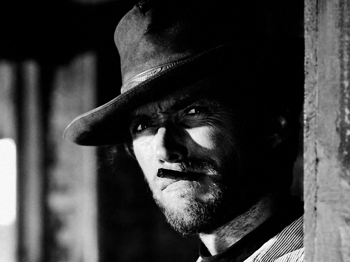 Clint Eastwood in a hat with a cigar